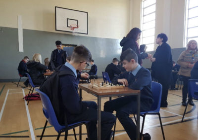 Students playing chess.